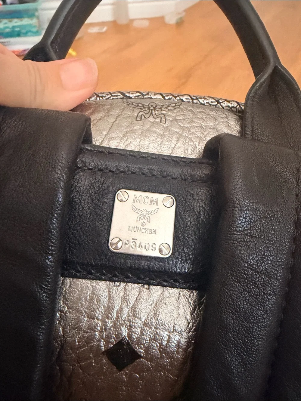 MCM Silver Leather Backpack with Purple Fur Pom